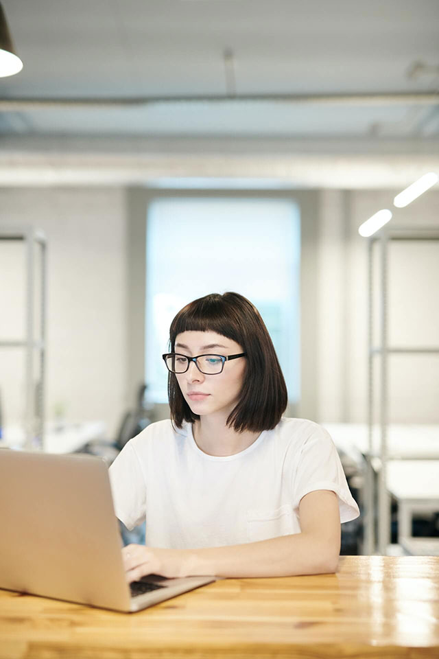 Woman planning her financial future on a laptop